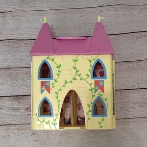 Whimsical Pink and Yellow Toy Castle